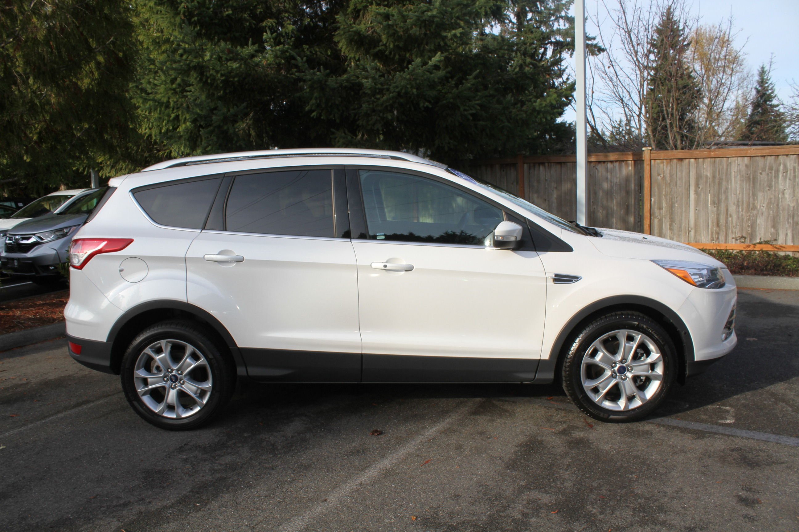Pre Owned 2016 Ford Escape Titanium 4WD Sport Utility in Kirkland 